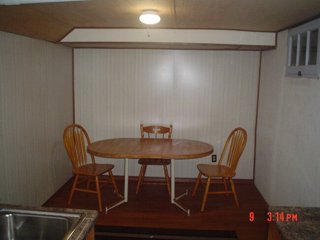 Cave-Dining table in Kitchen - 713 Main St