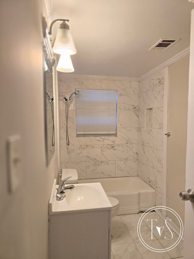 Building Photo - RATE DROP ALERT (was $1600/month)!