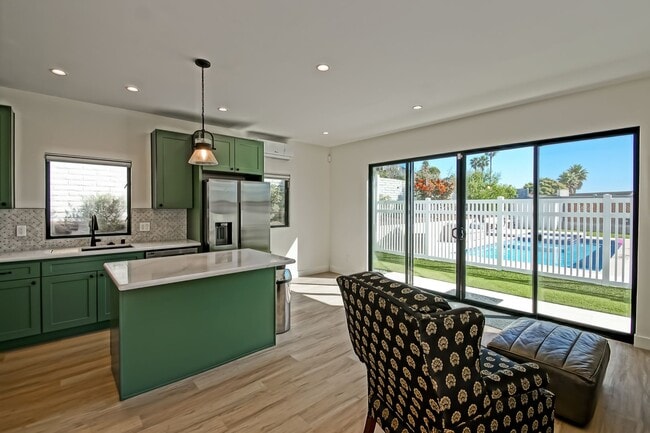 Building Photo - Beautifully Remodeled, Bright & Modern 4BR3BA Home w/ 2BR1BA Guest House On Sprawling Corner Lot ...