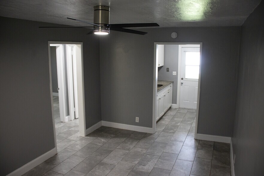Living Room view to Kitchen and Bedrooms - 128 NW 13th Avenue