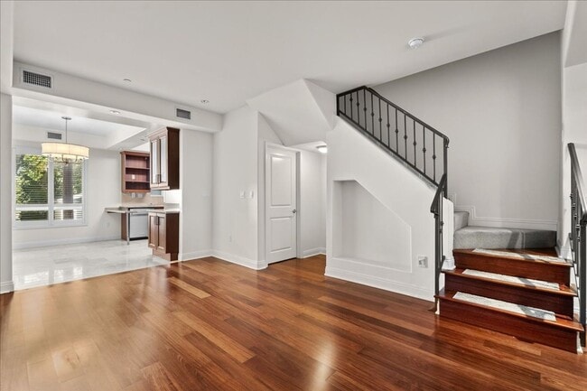 Building Photo - Spacious 3-Bedroom Tri-Level Townhome with...