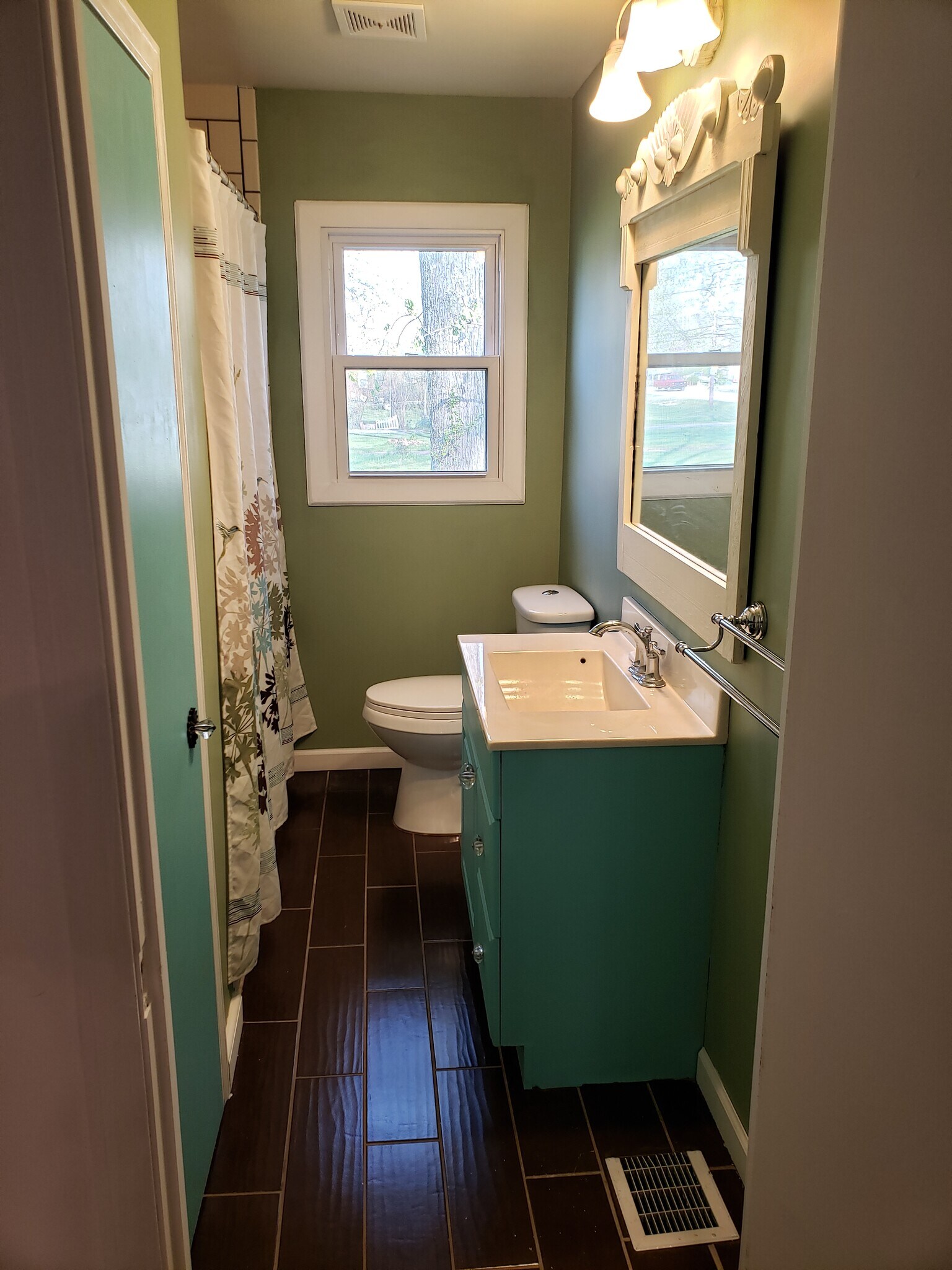 Bathroom has tile floor. - 10106 Wingfield Rd