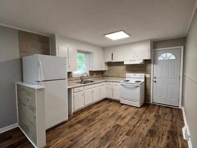 Building Photo - Fantastic Brick Ranch Home that has been refurbished - Open Floorplan with 3 bedrooms & 1.5 baths...