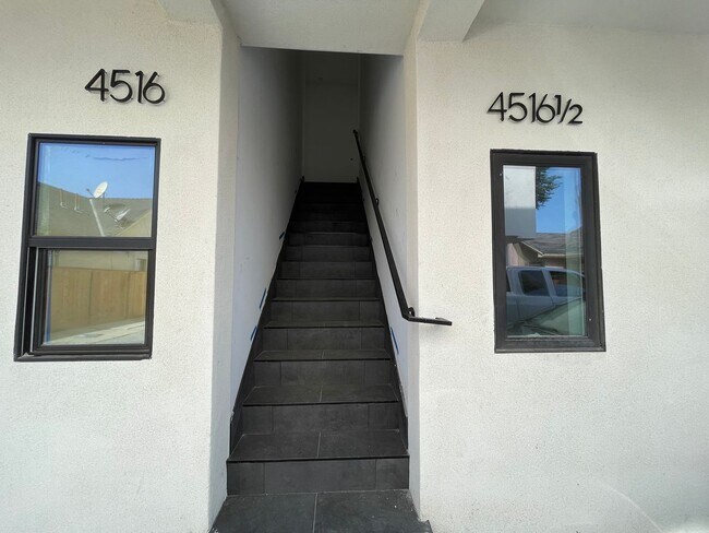 Building Photo - JUST COMPLETED MODERN TOWNHOMES! Never Liv...