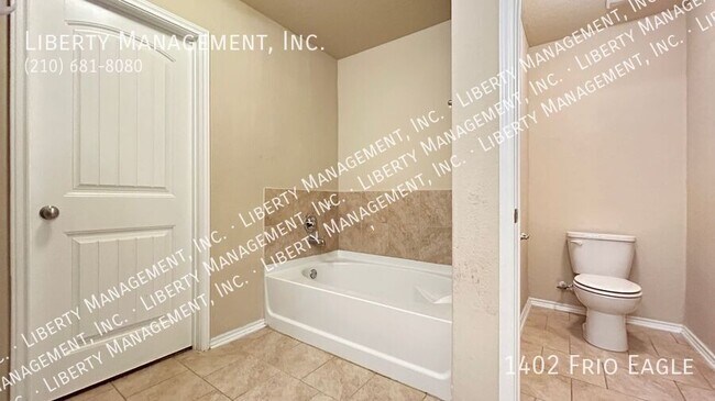 Building Photo - 1402 Frio Eagle