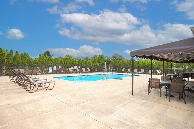 Building Photo - Single-level 2-bed, 2-bath townhome in 55+ community with pool, clubhouse, fitness center and gro...