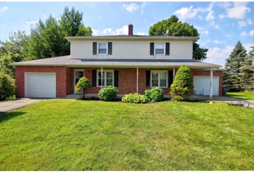 Front of Property, 8653 is the unit on the left - 8653 Refugee Rd