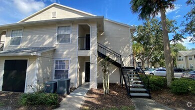 Building Photo - 2br/2ba Tradewinds Condo with Wood Floors ...