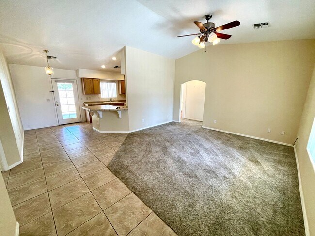 Building Photo - Inviting 3 Bedroom Home with RV Parking an...