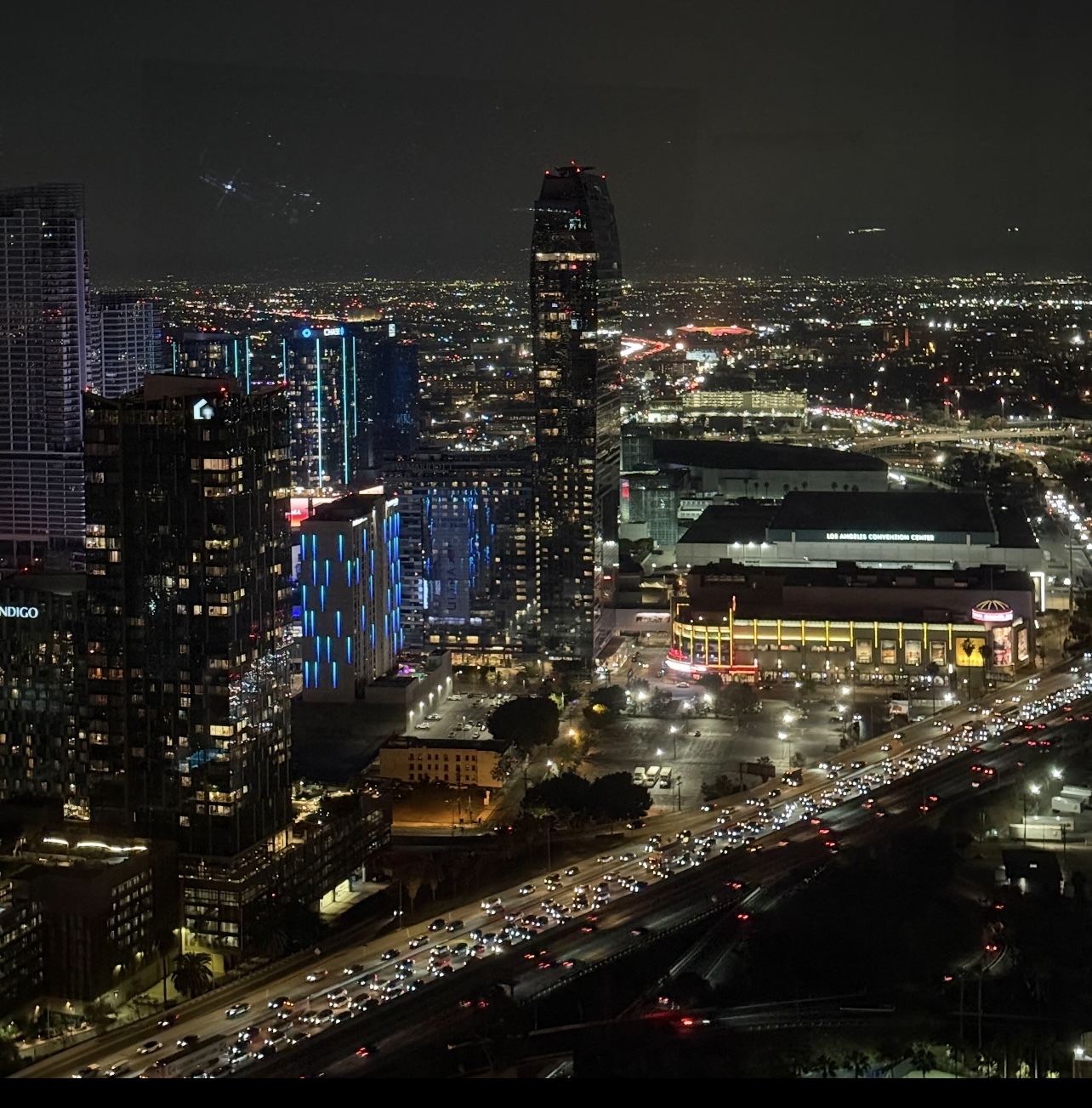 View of LA Live and Highway 110 at Night from the Condo - 1100 Wilshire Blvd