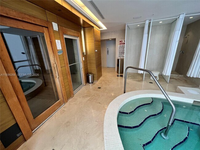 Building Photo - 18201 Collins Ave