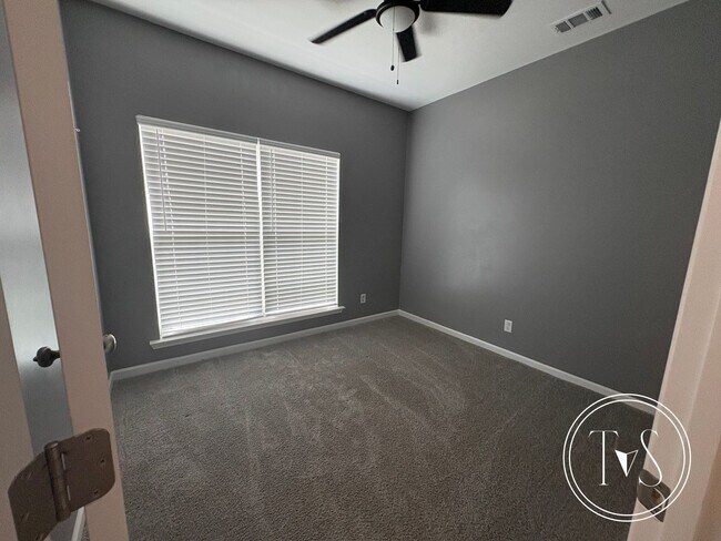 Building Photo - The perfect blend of modern living and small-town charm