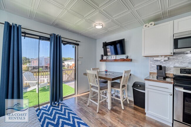 Building Photo - Beach Please @ 218 Sandpiper Dr