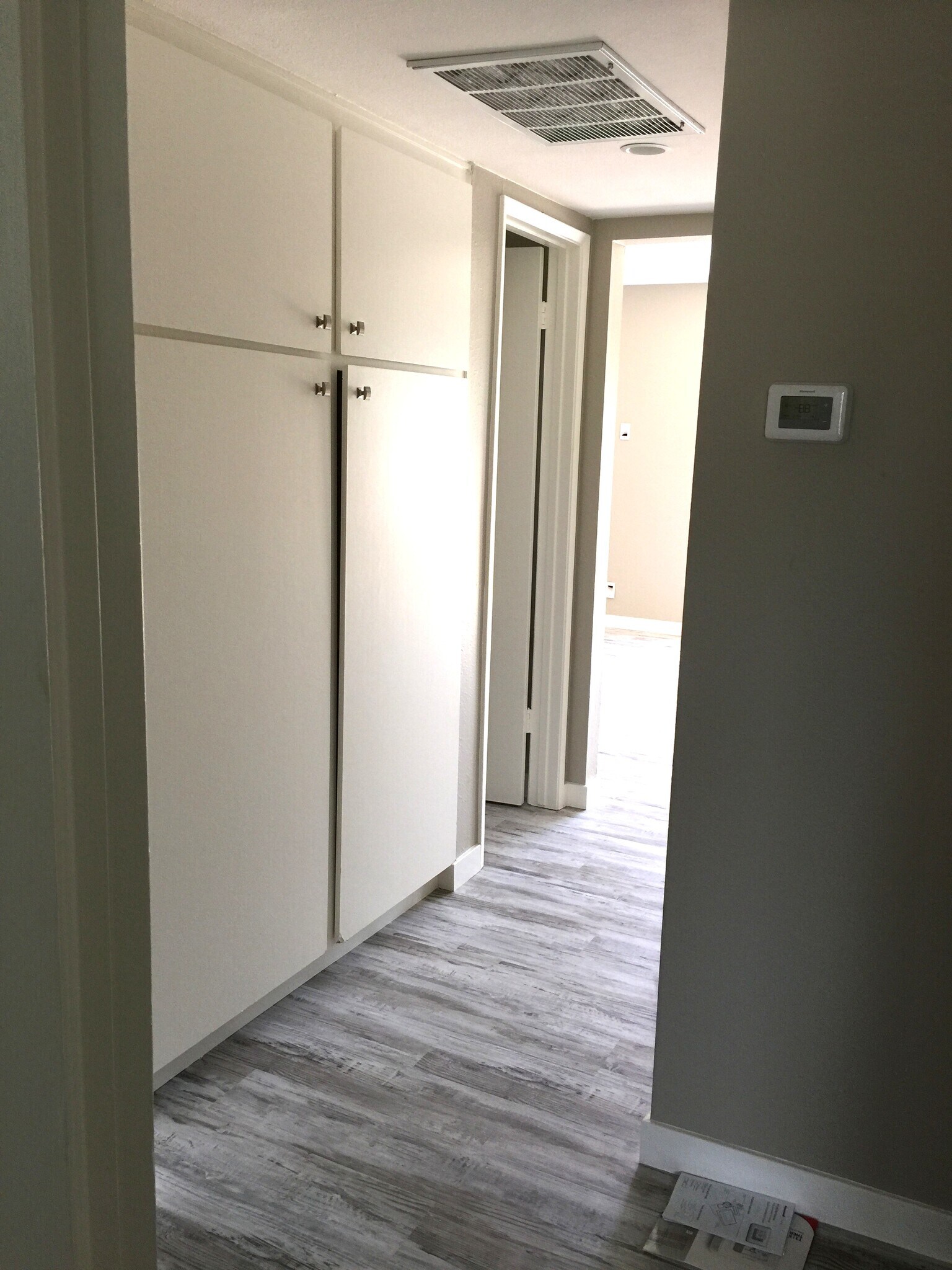 Hall with Cabinetry and Closet - 10678 Walnut St