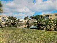 Building Photo - 8285 Sunrise Lakes Blvd