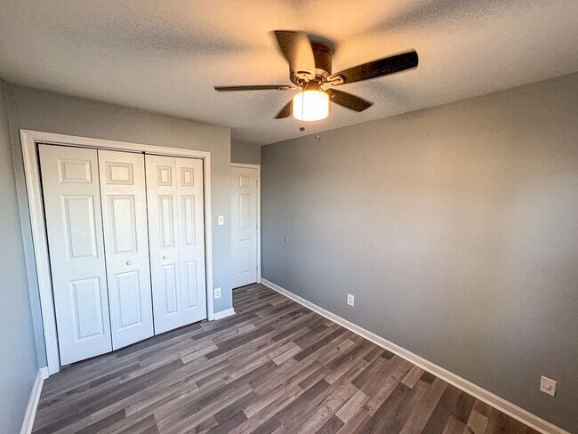 Building Photo - Introducing our spacious townhouse located...