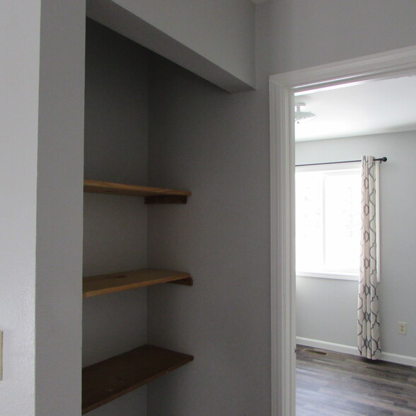 Hallway pantry shelves - 3565 N Tamar Rd