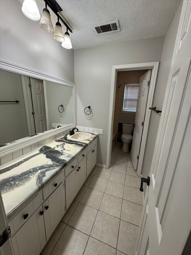 Building Photo - 3 BEDROOM  2 BATH 2 CAR GARAGE SITTING ON A CORNER LOT.  FEATURES INCLUDE: WASHER & DRYER HOOKUPS...