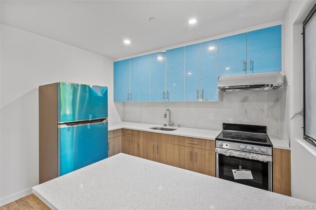 Building Photo - 213-41 38th Ave