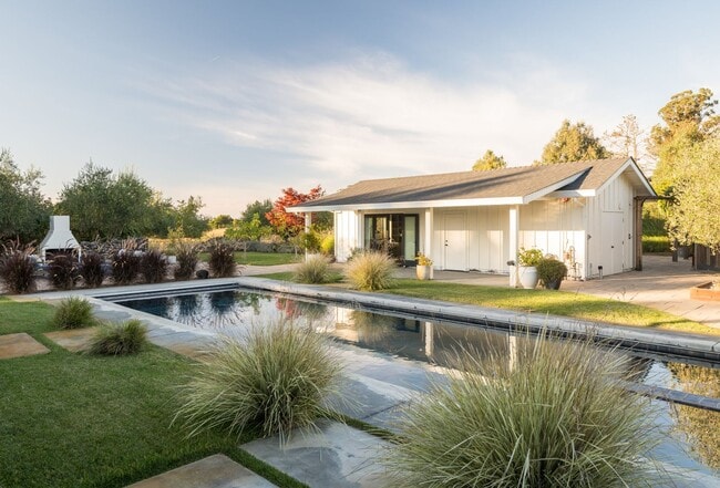 Building Photo - PURE Property Management Presents