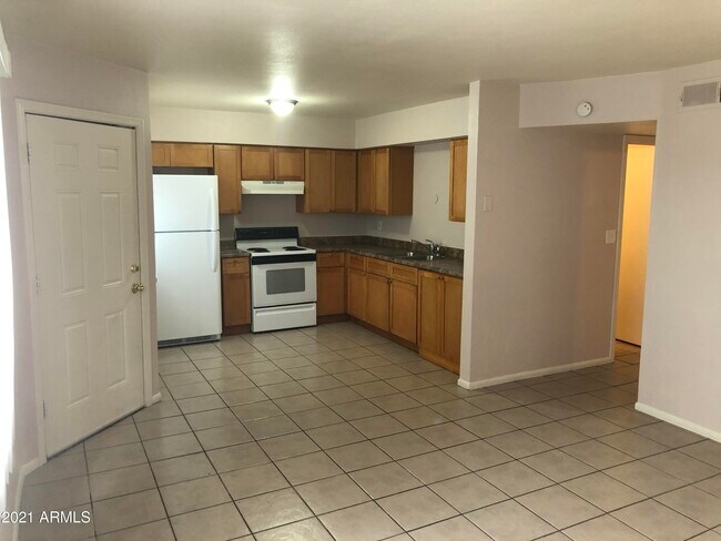 Building Photo - 1138 W Dragoon Cir