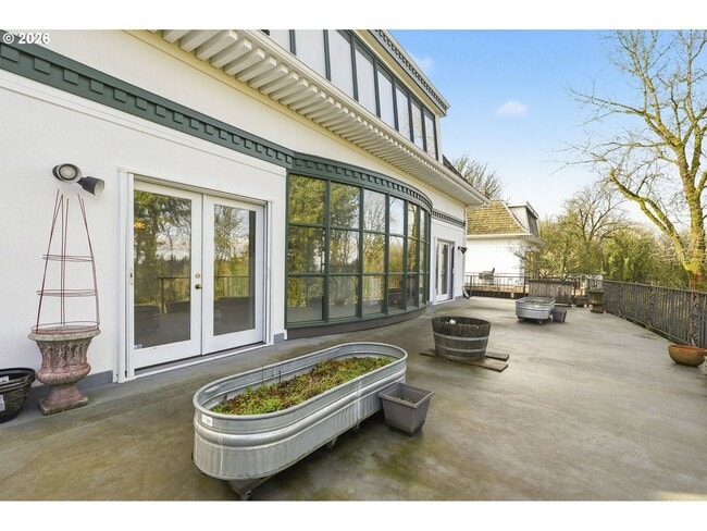 Building Photo - One-of-a-Kind 5BR Home with Floor-to-Ceiling Windows, Wraparound Decks & Breathtaking Treeline Views