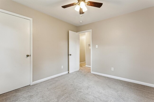 Building Photo - Charming brick rancher with modern kitchen...