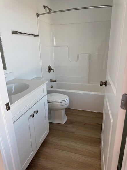 Bonus! Full bath on the first floor in addition to the upper level baths. - 119 Founders St