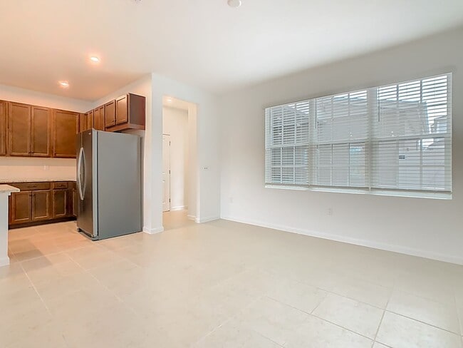 Building Photo - New Luxury Townhome in Celebration, FL Corner unit.  All porcelain tiled floors.  Aleutian model ...