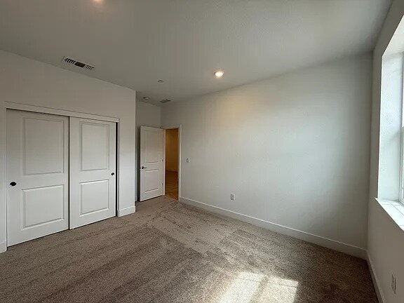 Building Photo - Be the first to enjoy this beautiful, newly built home near the Wild Hawk Golf Club