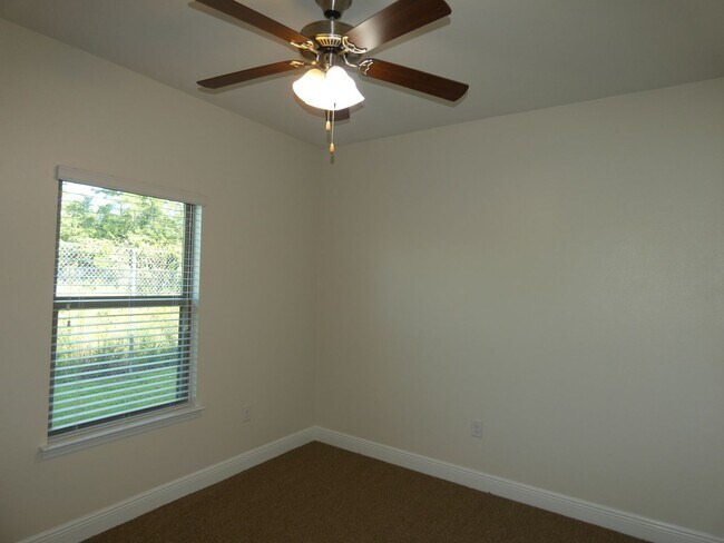 Building Photo - Spacious 5-Bedroom Home - Heart of Pace