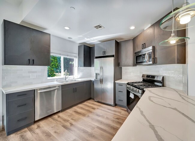 Building Photo - Modern 4-Bedroom Home in Prime West LA | Walkable, Spacious & Move-In Ready