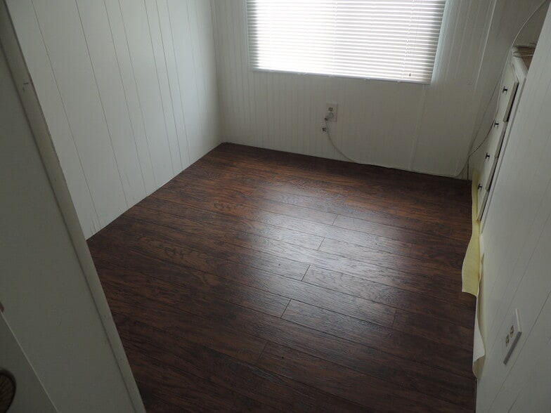 GUEST BEDROOM WITH BUILT IN STORAGE - 7424 Egress Ln
