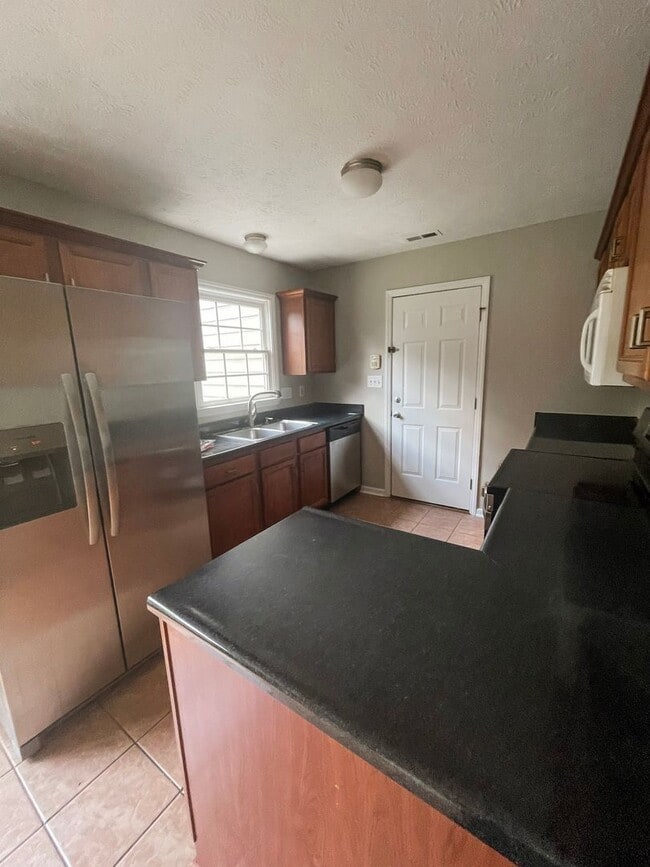 Building Photo - Coming Soon: 3 Bedroom 2 Bath - No pets