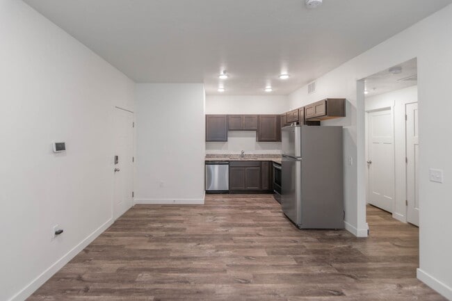 Building Photo - Up to one month free! 1-Bedroom Condos at ...