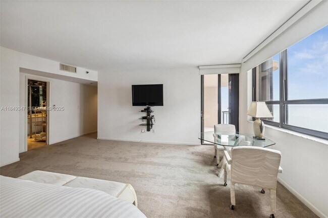 Building Photo - 10175 Collins Ave