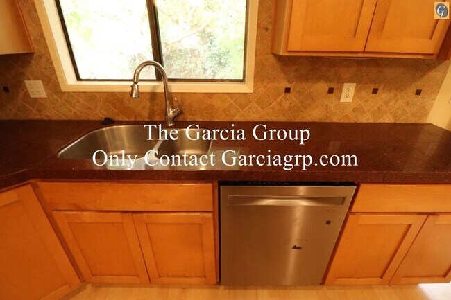 Building Photo - 9585 SW New Forest Dr