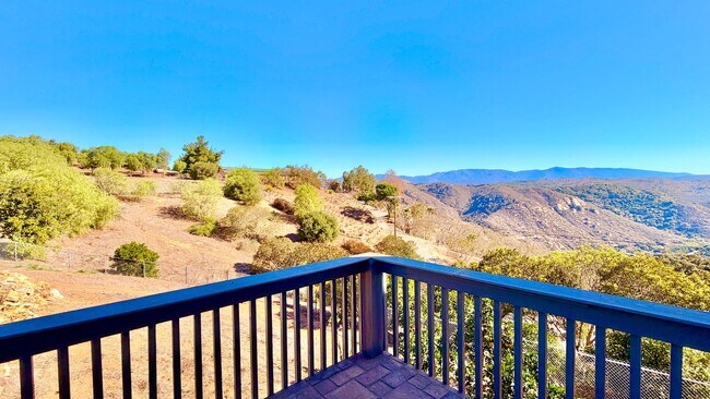 Building Photo - Spacious Two-Story Country Home with Amazing Views Looking out, and Privately Fenced and Gated Ya...