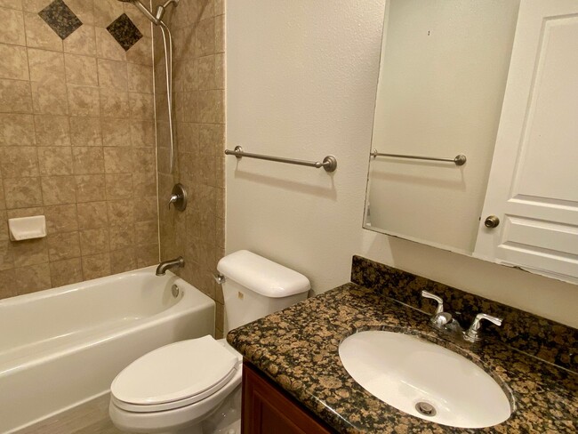 Building Photo - Bright Remodeled Upstairs Condo in Santa C...