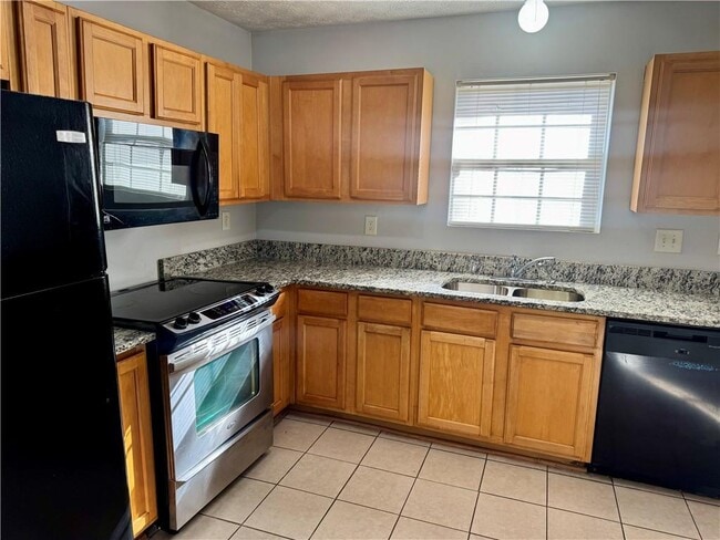 Building Photo - 5663 Windfall Ln