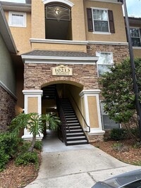Building Photo - 10213 Courtney Palms Blvd