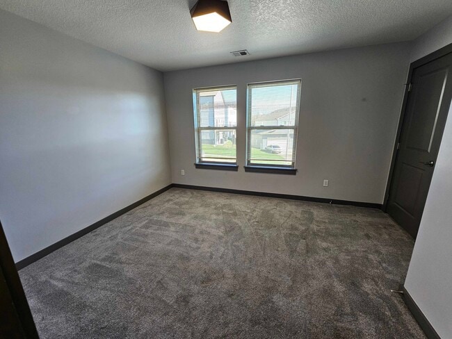 Building Photo - 7620 N Mercier Ct