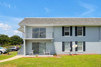Building Photo - "Bright 2-Bed, 2-Bath Condo Retreat with Pool & Lake Views"