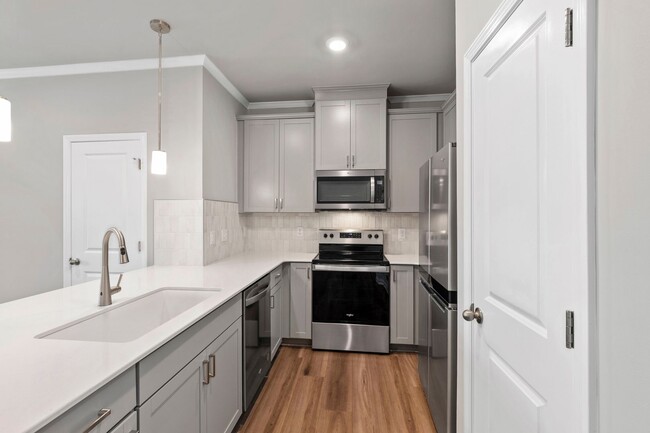 Building Photo - Modern 3-Bedroom Townhome with Luxury Fini...