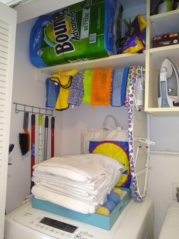 laundry closet with shelves - 1534 Amherst Ave