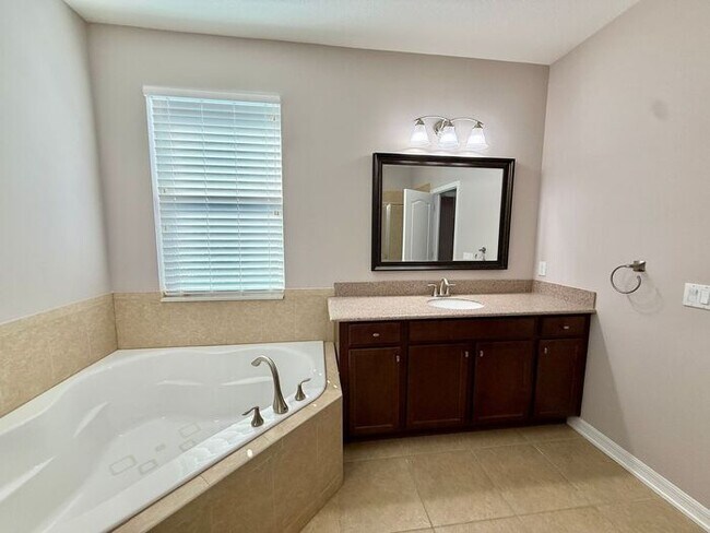 Building Photo - SPACIOUS Two Story Beautiful 5/4 Home in The Enclave At Aloma!