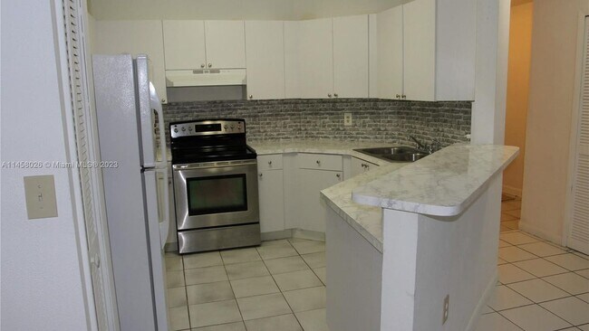 Building Photo - 6473 SW 128th Ct