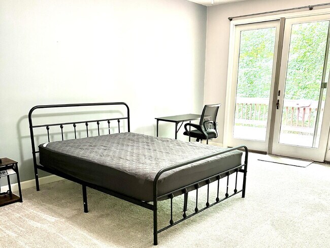 Building Photo - The Mylandia | Beautiful and spacious University City – Charlotte house with a backyard, offering...