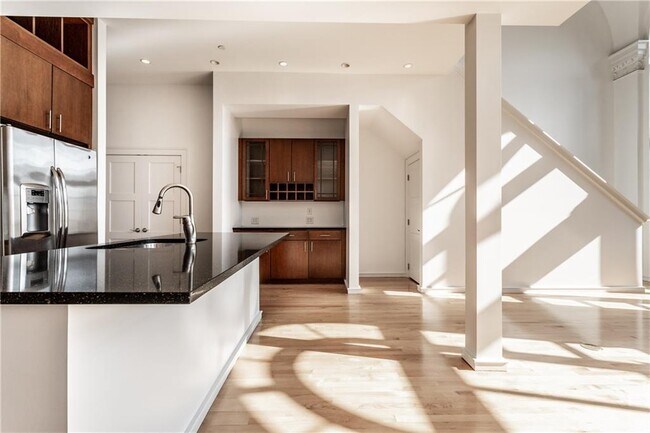Butler Wine Rack/Storage Under Stairs - 350 N Meridian St