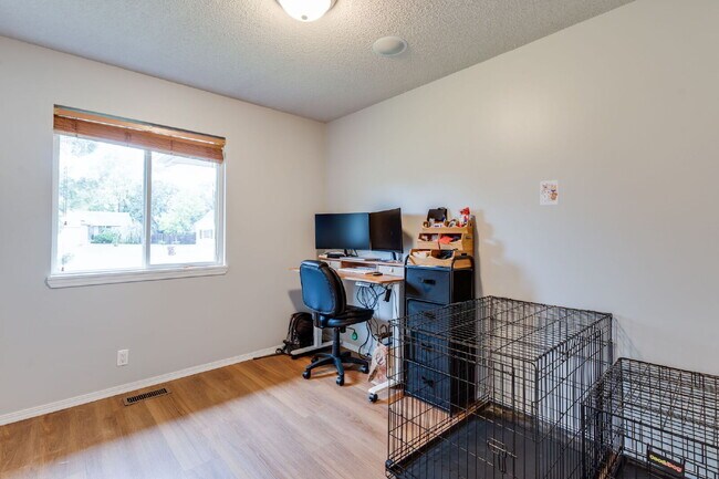 Building Photo - "Spacious 4-Bedroom Gem with 3 Full Baths ...